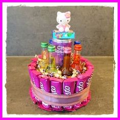 a pink basket filled with lots of bottles