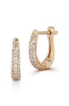 Shimmering diamond pavé makes these huggie hoop earrings shine from every angle. 3/8" drop; 1/8" width Hinge with snap-post closure Total diamond weight: 0.19ct. Color: G–H Clarity: SI 14k gold/diamond Imported >Diamond Guide Formal Pave Setting Huggie Hoop Earrings, Formal Diamond Huggie Earrings With Pave Setting, Diamond Huggie Earrings With Pave Setting, Elegant Diamond Huggie Earrings With Pave Setting, Fine Jewelry Huggie Earrings With Pave Setting, Fine Jewelry Diamond Huggie Earrings With Pave Setting, Small Hoop Diamond Earrings With Pave Setting, Everyday Luxury Huggie Earrings With Pave Setting, Classic Hoop Huggie Earrings With Pave Setting