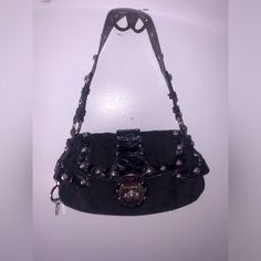 Super Stylish And Unique Vintage Guess Purse Early 2000s Y2k Adorable Black Handbag Super Gorgeous Designer Black Baguette Bag With Branded Hardware, Y2k Style Black Party Bag, Black Baguette Bag With Branded Hardware For Daily Use, Designer Black Handheld Baguette Bag, Black Satchel Bag With Branded Hardware, Black Baguette Shoulder Bag With Branded Hardware, Y2k Black Shoulder Bag With Adjustable Strap, Y2k Style Leather Shoulder Bag, Black Baguette Bag Satchel With Silver-tone Hardware