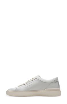 Breathable perforations and signature logo accents enrich a streamlined sneaker set on a cushioned footbed and classic cupsole for lasting wear. Lace-up style Cushioned footbed Leather upper and lining/synthetic sole Imported Classic High-top Sneakers With Round Toe And Perforations, Modern Leather High-top Sneakers With Perforations, Classic Lace-up High-top Sneakers With Perforations, Modern Low-top Slip-on Sneakers With Contrast Sole, Sporty Slip-on Sneakers With Contrast Sole For Everyday, Sporty Slip-on Sneakers With Perforated Toe Box For Everyday, Classic Slip-on Sneakers For Streetwear With Textured Sole, Sporty Slip-on Sneakers With Contrast Sole, Sporty Everyday Slip-on Sneakers With Contrast Sole