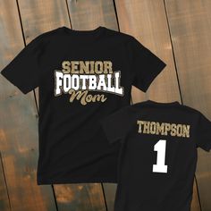 Custom Senior Football Mom Shirt *This custom shirt is handmade with professional vinyl. *Our shirts are unisex and are true to size! *In the photo's you will be able to see the custom options in regards to color that you may choose from. *We use 100% cotton shirts. The glitter material does not wash off and will last through multiple washes.  *If your shirt color is out of stock we will contact you as soon as possible to see if you would like to change shirt colors. By purchasing from us you agree to the following statements: *Due to the custom nature of this item we do not accept exchanges or refunds. *We are also not responsible for lost packages. Please contact your local post office for lost package information. Football Mom Shirts Ideas Diy, Customizable Black T-shirt For Football Season, Senior Mom Football Shirt Ideas, Football Mom Shirts Ideas, Football Shirt Designs, Senior Football, Football Mom Shirts