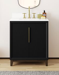 a bathroom vanity with a mirror above it and two faucets on the sink