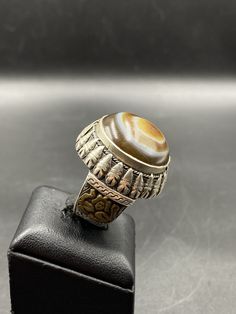 Wonderful Afghani Silver Ring With Beautiful Suleimani Aqeeq Agate For Protection From Evil Eyes , Size 9 US Round Agate Gemstones For Spiritual Use, Artisan Agate Round Rings, Artisan Round Agate Gemstones, Antique Brown Agate Jewelry, Traditional Silver Agate Jewelry, Traditional Round Agate Jewelry, Round Agate Jewelry With Stone Setting, Formal Agate Rings With Natural Stones, Artisan Agate Cabochon Rings