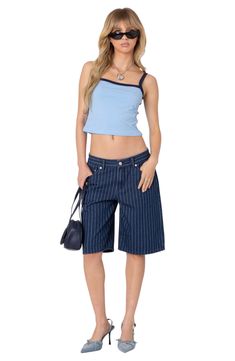 A relaxed silhouette and smart pinstripes amplify the trend-savvy appeal of denim Bermuda shorts rendered in a medium-blue wash. Zip fly with button closure Five-pocket style 100% cotton Machine wash, dry flat Imported Casual Vertical Striped Jeans For Summer, Casual Summer Jeans With Vertical Stripes, Trendy Blue Bottoms With Vertical Stripes, Striped Denim Shorts For Spring, Denim Jeans With Vertical Stripes, Casual Vertical Stripes Denim Jeans, Casual Striped Denim Shorts, Trendy Denim Bottoms With Vertical Stripes, Trendy Pinstripe Bottoms For Summer