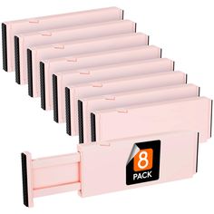 six pink floppy drives are stacked up in a row with the 8 pack logo on them