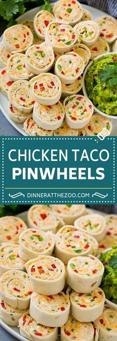 chicken taco pinwheels on a plate with guacamole and salsa