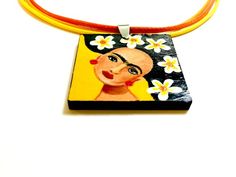 Our passion and dedication went into crafting a truly extraordinary piece for our shop, Fridamaniacs. We strived to produce something truly one-of-a-kind, not commonly found elsewhere. This vibrant, hand-painted Frida Kahlo pendant is a stunning work of art. Made with high-quality acrylic paint and sealed with a protective gloss coat for long-lasting durability. Lightweight and completely unique, it makes for the perfect gift for that special someone.We used three (3) waxed cotton necklace cords Hand Painted Pendant, Cotton Necklace, Waxed Cotton, Coin Purse, Original Artwork, Acrylic Painting, Perfect Gift, Hand Painted, Pendant Necklace