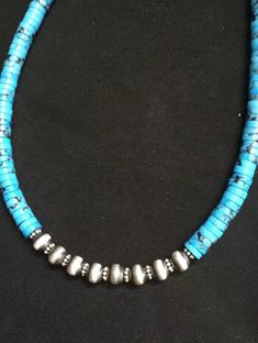 sterling silver blue turquoise bead necklace .The necklace measures 18 inches.. Adjustable Blue Turquoise Necklace With Silver Beads, Blue Beaded Turquoise Necklace In Sterling Silver, Beaded Turquoise Necklace In Sterling Silver, Sterling Silver Beaded Blue Turquoise Necklace, Sterling Silver Beaded Turquoise Necklace, Southwestern Single Strand Blue Turquoise Necklace, Silver Turquoise Necklace With Hand-strung Round Beads, Artisan Blue Turquoise Necklace With Sterling Silver Clasp, Southwestern Blue Turquoise Necklace With Polished Beads