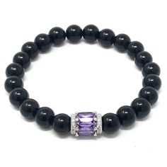 Precious looking black onyx & purple striped agate gemstones bracelets with a platinum plated purple bead• elegant, simple and meaningful! Black Onyx absorbs and transforms negative energy, and helps to prevent the drain of personal energy. Black Onyx aids the development of emotional and physical strength and stamina, especially when support is needed during times of stress, confusion or grief. The 2 piece set includes: 1x 8mm black onyx bracelet 1x 8mm purple striped agate bracelet ** the brac Black Amethyst Gemstone Beads Jewelry, Black Amethyst Beads Jewelry 8mm, Black Amethyst 8mm Bead Jewelry, Elegant Silver Agate Beaded Bracelets, Elegant Agate Beaded Bracelets For Gift, Elegant Round Purple Crystal Bracelet, Elegant Purple Round Crystal Bracelet, Elegant Agate Stretch Bracelet Gift, Elegant Gemstone Beaded Bracelets For Formal Occasions