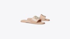 Double T Deco Sport Slide: Women's Designer Sandals | Tory Burch Luxury Slip-on Slides For Spring, Luxury Synthetic Slip-on Slides, Luxury Slides With Cushioned Footbed, Luxury Synthetic Slides, Luxury Spring Slides, Luxury Flat Slides With Cushioned Footbed, Luxury Cushioned Slides Flat, Luxury Cushioned Flat Slides, Luxury Leather Slides For Spring