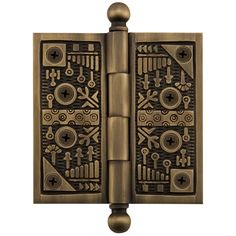 an antique brass door with decorative designs on it