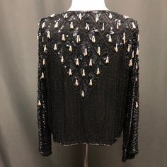 Vintage sequins beaded pearl silk top. Absolutely beautiful l love this dressed up or just with jeans and sneakers😎FIt’s small to medium dm for measurements if needed *Note small row of beads undone at shoulder/neck seen in the last pic hardly noticeable I’ll trim off the threads#Vintage #Sequins #beaded #Tops #holiday Glamorous Embellished Tops For Party Season, Glamorous Embellished Tops For Fall, Rhinestone Fringe Tops For Party Season, Glamorous Fall Tops With Rhinestones, Fall Embellished Tops For Night Out, Beaded Tops For Night Out In Spring, Embellished V-neck Party Top, Embellished V-neck Top For Party, Glamorous Embellished V-neck Tops