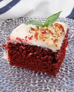 a close up of a piece of cake on a plate with the words, mini red velvet cake perfect for 1 / 2 people