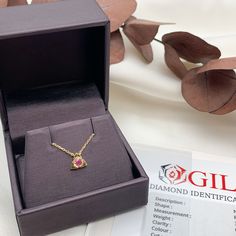 Certified Genuine Ruby Pendant set with Genuine Ruby, size 3 millimeters diameter, 0.12 Carats.Solid 14k Yellow Gold ☞ made to last.Click here for ☞ Solid Gold CollectionRuby Details:• CERTIFIED Genuine Ruby• Weight: 0.12 Carats• Dimensions: 3mm• Color: Red• Cut: Round• Origin: BurmaSolid Gold Details:• 2.0 grams of 14k Solid Yellow Gold• Dimensions: Necklace Length 16in to 18in• Lasts a lifetime - Perfect for everyday use (won’t tarnish)!*Final weight & dimensions depending on the chosen neckla Ruby Pendant Set, Gold Triangle, Gold Letter Necklace, Triangle Necklace, Jewelry Safe, Ruby Pendant, Bar Pendant, The Chosen, Solid Gold Jewelry