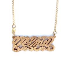 Own a one of a kind custom hand made nameplate necklace. This design can be made in your name or any name of your choice. Its completely hand made from start to finish. The attention to detail really comes out as compared to a machine made one that looks bland and no design. This particular designs comes in yellow gold back and white gold top with hand carved heart with diamond cuts throughout the piece to give it a beautiful luster and shine while making the nameplate really stand out. You can Name Necklace Design, Carved Heart, Nameplate Necklace, Necklace Design, Gold Top, Pure Gold, Name Plate, Name Necklace, Real Gold