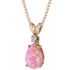 Perfect in pink We love pink Opals for their bubbly pink hues which radiate charm, esprit and tenderness. No wonder we're blushing in pink. This everyday luxury pendant features a pear shape Peora created Pink Opal gemstone and natural Diamond accent in 14K rose gold. Responsibly sourced in every sense, our created Pink Opal gemstones are physically, chemically, and optically identical to their natural counterparts. We're big fans of eco-luxury. Handcrafted in pure 14K rose gold goodness, this pendant has been carefully coated in an elegant rhodium finish. Our artisans are expertly trained in this process which fortifies the pendant's strength, shine and brilliance. Main Stone Lab Created Pink Opal 1 carat, pear shape, 10 x 7 mm Pink iridescent hues Accent Stone Natural Diamond 0.05 carats Blue Sapphire Necklace, Blue Topaz Bracelet, Pretty Fashion, Rose Gold Pendant, Rose Gold Pink, Ruby Earrings, Round Stud Earrings, Emerald Earrings, Silver Shop