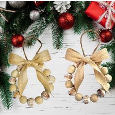 two christmas wreaths with bows and ornaments