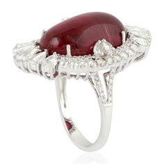 For Sale on 1stDibs - This stunning statement ring has been meticulously crafted from 18-karat gold. It is centered with a striking 16.6 carats Rubelite and 1.5 carats of glimmering Luxury Oval Ruby Diamond Ring, Luxury Ruby And Diamond Oval Cabochon Ring, Luxury Ruby Ring With Oval Cabochon Diamond, Luxury Gia Certified White Gold Ruby Ring, Luxury Platinum Ruby Ring, Luxury Oval Cabochon Ruby Ring, Luxury Ruby Gemstone Ring In Platinum, Oval Cabochon Ruby And Diamond Ring, Luxury Ruby Ring With Round Cut Gemstone