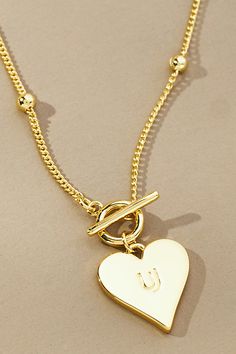 14k gold-plated brass Lobster clasp Imported | Touch of Love Necklace by Uncommon James in Gold, Women's, Gold/Plated Brass at Anthropologie Adjustable Gold Charm Necklaces With Heart Charm, Yellow Gold Chain Necklace With Gold Clasp As Gift, Adjustable Gold Plated Necklaces With Heart Charm, Adjustable Yellow Gold Necklace With Heart Charm, Gold Toggle Necklace Tarnish Resistant For Gift, Gold Plated Toggle Necklace, Tarnish Resistant, As A Gift, Gold Plated Toggle Necklace As Gift, Gold Brass Necklace With Heart Charm, Valentine's Day Gold-tone Necklaces With Adjustable Chain