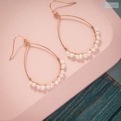 Teardrop outline Earrings with freshwater pearl accent It makes a great everyday earrings. Or, if you are thinking of getting a thoughtful gift for your bridesmaids, this earrings is it! They can wear it during your wedding and also after that. Definitely a bridesmaid gift that will be appreciated and enjoyed for a long long time. Measurements: Approximate Length: 2 **Important: Unless otherwise noted, all of the findings (ear wires, chains, etc.), framed gems, and charms in the jewelry is plate Dainty Wire Wrapped Pearl Earrings, Dainty Teardrop Pearl Earrings Wire Wrapped, Dainty Teardrop Wire Wrapped Pearl Earrings, Dainty Pearl Teardrop Hoop Earrings, Raw Quartz Necklace, Hoop Dangle Earrings, Earrings Bridesmaid, Freshwater Pearls Earrings, Pearl Hoop Earrings