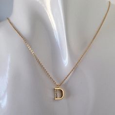 Custom Initial Pendant Necklace, Gold Plated Personalized Tiny Letter with Cubic Zirconia Crystals, Minimalist, Monogram, Bridesmaids Gift This beautiful minimalist necklace features a gold plated initial, encrusted with CZ crystals. Dangling from a delicate cable link chain, it's just the piece to bring an extra-special touch to your favorite outfits. It makes a heartfelt gift for your bff, your bridesmaids, or any special person in your life. Details: Materials: gold plated brass and Cubic Zir Gold Initial Pendant, Letter Jewelry, Wedding Party Gift, Bridesmaid Proposal Gifts, Initial Pendant Necklace, Free Bracelet, Proposal Gifts, Gold Initial, Will You Be My Bridesmaid