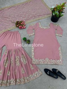 Launching New Designer Party Wear Look Fancy Top-Dupatta and Fully Stitched Gharara *Fabric Detail* Top *Top Fabric *         :Heavy Faux Georgette With *Embroidery Sequence Work with Sleeve and Heavy Lace Work* *Top Inner*  :Heavy Micro Cotton  *Top Length*       : 36-38 *Top Size*.            :  *M(38), L(40), XL(42), XXL(44) *(Fully Stitched Complete Ready To Wear)* 💃👚 *Gharara *Gharara Fabrics* :Heavy Faux Georgette With Heavy Embroidery Sequence Work  *Gharara Length*:40-41 Inch *(fully stitched)* 💃👚 *Dupatta* 👚💃 *Dupatta Fabric * :Heavy Faux Georgette With *Heavy Embroidery Sequence Work With Lace Border* Country of origin : India Fitted Anarkali Sharara With Gota Work, Fitted Sharara With Gota Work For Eid, Fitted Gota Work Palazzo Set For Wedding, Fitted Mirror Work Sharara For Eid, Pink Chinon Palazzo Set For Wedding, Fitted Sharara With Mirror Work For Eid, Eid Mirror Work Fitted Sharara, Diwali Fitted Sharara With Gota Work, Fitted Dabka Sharara In Georgette