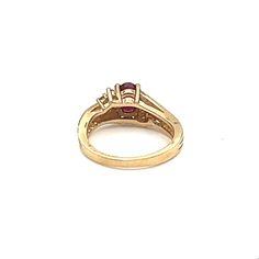 This stunning oval-shaped ring is crafted from 14k yellow gold and features a gorgeous 0.93 carat red ruby as its main stone. The ruby is accentuated by sparkling diamonds and set in an elegant design. The ring is size 5 3/4 and is made from high-quality materials. The piece is perfect for those looking for a fine jewelry piece that will make a statement. The gemstones are of exceptional quality and the design is timeless. This ring is a must-have addition to any jewelry collection. 22k Gold Ring, Art Deco Sapphire Ring, Oval Sapphire Ring, Sapphire Eternity Ring, Ruby Diamond Ring, Vintage Cocktail Ring, Ruby Diamond Rings, Cabochon Ring, 18k Gold Ring