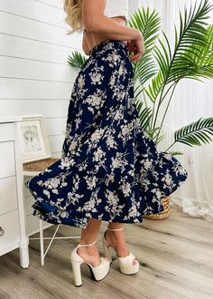 The Emes Shop skirt is detailed with vintage floral prints. Features a high waist. gartered waist. A-line silhouette. and below knee length. Pair it with a puff sleeve blouse and sandals for a classy look.MATERIAL:100% Soft Poly MEASUREMENTS:Dress Length is 31"-33"in Small | Waist: 26"-28"in Medium | Waist: 28"-30"in Large | Waist: 30"-32"in X Large | Waist: 32"-34"in MEASUREMENTS:Dress Length is 78"-83"in Small | Waist: 66"-71"cm Medium | Waist: 71"-76"cm Large | Waist: 76"-81"cm X Large | Waist: 81"-86"cm Flowy Summer Midi-length Bottoms, Beach Midi-length Gathered Skirt, Flowy Midi Length Bottoms For Day Out, Midi Length Gathered Skirt For Beach, Flowy Floral Print Bottoms For Day Out, Flowy Bottoms With Floral Print For Day Out, Flowy Midi Skirt For Garden Party, Vacation Midi Length Gathered Skirt, Midi Pleated Skirt Bottoms For Vacation