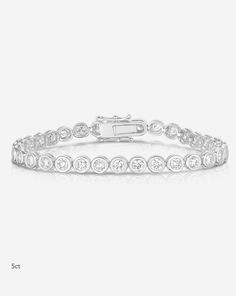 Ring Concierge Bracelets 14k White Gold / 6.5" / 5 Carats Bezel-Set Classic Diamond Tennis Bracelet Formal Oval Tennis Bracelet With Single Cut Diamonds, Classic Jewelry With Single Cut Diamonds, Classic Diamond Bracelet With 17 Jewels, Timeless Round Gold Bracelet With Cubic Zirconia, White Gold Bracelet With Diamond Accents, Classic Gold Bracelet With Round Cut Cubic Zirconia, Classic Gold Bracelet With Cubic Zirconia Round Cut, Anniversary White Gold Diamond Bracelet, Classic Wedding Tennis Bracelet With Single Cut Diamonds