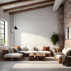 a living room with white brick walls and wooden pallets on the floor as well as furniture