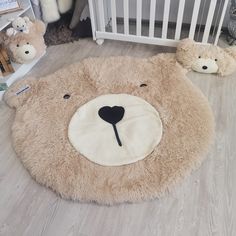 there is a teddy bear rug on the floor