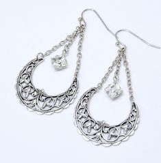 "Here is a unique pair of handmade earrings featuring highly detailed antique silver crescent moons accented with brilliant clear Swarovski square crystals. Beautiful and romantic Bohemian style jewelry. Earrings measure 2 3/16\" long end to end (from top of ear wire to the base of crescent). Earrings measure 1 1/8\" at the widest point. Antique silver plated solid brass french hook wires are lead and nickel free. These earrings are lightweight and easy to wear. All jewelry arrives in a complime Clear Crystal Earrings, Geode Necklace, Earrings Moon, Bohemian Style Jewelry, Blue Crystal Earrings, Quartz Pendant Necklace, Hoop Earrings Silver, Filigree Necklaces, Bohemian Necklace