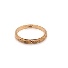 Vintage 1940's 14k yellow gold engraved orange blossom stackable wedding band. The band is 2.5mm wide and 1.1mm high off the finger. The finger size is a 5.25 and it can be adjusted upon request. The band is perfect to stack with other bands or match with your vintage engagement ring. Heirloom Yellow Gold Stackable Rings, Heirloom Yellow Gold Engraved Stackable Rings, Heirloom Engraved Yellow Gold Stackable Rings, Heirloom Style 14k Gold Stackable Engraved Ring, Heirloom 14k Gold Stackable Engraved Ring, Heirloom 14k Gold Stackable Rings, Heirloom Style 14k Gold Stackable Rings, Heirloom 14k Gold Engraved Bands, Heirloom Engraved Stackable 14k Gold Ring