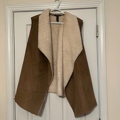 Gorgeous Cream And Tan Vest From Ralph Lauren. Tan Is A Faux Suede And Inside Is A Soft Faux Fur Material. Great Condition. Fast Shipping. Make Me An Offer. Bundle And Save! Tan Vest, Faux Suede Vest, Faux Fur Material, Suede Vest, Lauren Ralph Lauren, Faux Suede, Faux Fur, Jackets & Coats, Jackets For Women