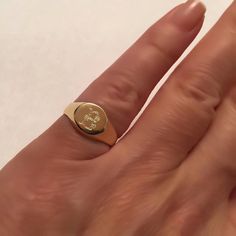 "Pinky ring, Engraved ring, Initial Ring, Personalized Ring Engraved Signet ring with Round Seal- Best quality 18k Gold Plate Engraved 1 letter - Vintage style Diameter: 0.7 mm = 0.27\" Please note in the \"notes to seller\" at checkout. : * state your ring size * letter you want to apper The product will arrive to you packed in gift box and padded envelope to maintain the product Our jewelry are water resistant and comes with 1 year warranty Thank you for your interest. Please check out our oth Symbolic Yellow Gold Signet Ring For Promise, Yellow Gold Engraved Initial Ring For Promise, Symbolic 14k Gold Signet Ring For Promise, Dainty Initials Jewelry For Promise, Dainty Yellow Gold Signet Ring For Promise, Symbolic 14k Stamped Promise Rings, White Gold Oval Signet Ring For Promise, White Gold Tarnish Resistant Initial Open Ring, Tarnish Resistant Promise Ring