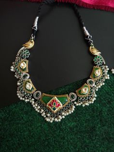 Antique silver replica necklace in Contemporary Look. Fusion Jewellery. Most demanding and liked necklace with beautiful color. Traditional Indian jewelry necklace. Add charm and charisma to your beautiful personality with these stunningly handcrafted silver look alike pendand necklace . Wear it with any of your formal or casual outfits and grab compliments all the way! Fusion Jewellery, Beautiful Personality, Traditional Indian Jewellery, Traditional Indian, Your Beautiful, Look Alike, Vintage Bags, Jewelry Necklace, Ring Bracelet