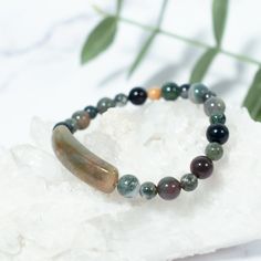 This beaded bracelet is made of natural Indian Agate Gemstone, which is great for bringing you confidence, physical strength, and emotional security. Our Gemstone Beaded Bracelets are designed to feel lightweight, comfortable, and effortless.Stringing each natural stone is part of our mindful Intention when we create this beaded bracelet, infusing positive energies, love, and happiness within each design.We combine meaningful symbols and natural gemstones giving this one accessory relevance in e Meditation Hand-strung Agate Crystal Bracelet, Agate Healing Bracelet For Meditation, Holistic Agate Bracelet For Meditation, Spiritual Agate Crystal Bracelet For Healing, Hand-strung Agate Beaded Bracelets For Healing, Agate Bracelets With Natural Stones For Meditation, Agate Natural Stone Bracelets For Meditation, Spiritual Agate Beaded Bracelets For Healing, Holistic Agate Bracelet With 8mm Beads