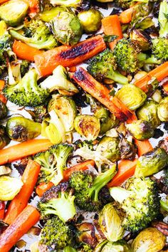 a mixture of vegetables including broccoli, carrots and brussel sprouts