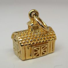 "This three-dimensional, sterling silver Gold Vermeil Barn charm features barn doors, open windows and a richly textured shake roof. This charm is plated with 14k gold. \"Down on the Farm\" is inscribed on the bottom. Vintage and in brand new, never worn condition. Made by Brown County Silver. 1/2\" wide 5/16\" deep 4.8 grams See more @ https://www.etsy.com/shop/brocosi" Gold Jewelry With Hallmark For Wedding Gift, Wedding Ideas Farm, Barn Wedding Ideas, Shake Roof, Farm Wife, Brown County, Wedding Charm, Sterling Silver Charms, Down On The Farm