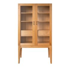 a wooden cabinet with two doors and shelves on one side, against a white background