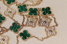 Indulge in the opulent elegance of our CLOVER 20 MOTIFS MALACHITE DIAMOND GOLD NECKLACE. Crafted with 20 stunning motifs adorned with malachite and diamonds, this necklace exudes luxury and sophistication. Elevate any outfit with this exclusive piece that embodies the beauty of art and fashion. ADDITIONAL INFORMATION Color: Gold Stone: Malachite, Cubic Zirconia Ref. vcarp34806 Material:- 925 Sterling Silver - 18k Gold Plated- 18k Real Gold ( contact us via instagram) Length of chain : 84cm Our r Diamond Gold Necklace, Trinity Bracelet, Art And Fashion, Detailed Jewelry, Gold Diamond Necklace, Gold Stone, Diamond Gold, Love Bracelets, Love Necklace