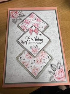 a birthday card with pink roses on it