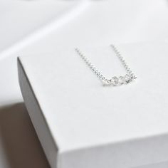 "This one of a kind, hand-crafted necklace showcases your preferred number of raw salt and pepper herkimer diamonds, centered on a dainty but durable chain in your preferred length and finish. Each stone is raw and natural, so they may vary oh-so-slightly from one another. Chain Finish Options: * 14k Gold Filled * Rose Gold Filled * Sterling Silver Necklace Length Guide: * 14\"-15\" lays closely around neck * 16\" fits loosely around neck * 18\" lays on collarbone * 20\" lays just below collarbo Minimalist Adjustable Charm Necklace With Heart Pendant, Adjustable Minimalist Heart Pendant Charm Necklace, Sterling Silver Necklace With Cable Chain For Gift, Minimalist Adjustable Heart Pendant Charm Necklace, Round Pendant Cable Chain Jewelry As Gift, Round Cable Chain Necklace Gift, Silver Birthstone Necklace With Delicate Chain For Gifts, Minimalist Birthstone Pendant Necklace With Adjustable Chain, Minimalist Silver Birthstone Necklace With Adjustable Chain