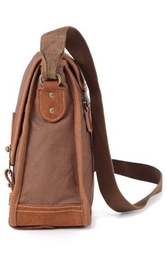 With a stylish design that can be carried by men and women, this flap bag offers plenty of slots to organize all of your essentials when traveling through town. 14"W x 12"H x 5"D; 24" strap drop Textile/leather Imported Brown Shoulder Bag With Anti-theft Pocket, Casual Brown Laptop Bag For Outdoor, Brown Crossbody Shoulder Bag With Anti-theft Pocket, Canvas Bags With Anti-theft Pocket For Everyday Use, Brown Anti-theft Crossbody Shoulder Bag, Everyday Canvas Bag With Anti-theft Pocket, Casual Brown Laptop Backpack, Outdoor Brown Bag With Anti-theft Pocket, Brown Bags With Anti-theft Pocket For Daily Use