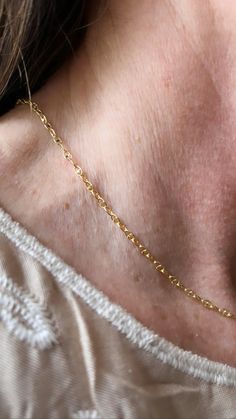 This delicate chain is a reflection of the Phoenicians (ancient Greek ancestors) symbol for life, rebirth and a drive to become godlike. The 19th letter of their alphabet. 18 carat gold over 925 sterling silver. 100% hypoallergenic. 15 inch chain and can extend to 17 inches. Ancestors Symbol, Gold Chain Necklace With Initial Pendant, Classic 14k Gold Filled Chain Necklace Gift, Everyday Hypoallergenic Yellow Gold Necklace, Hypoallergenic Yellow Gold Plated Charm Necklaces, Hypoallergenic Yellow Gold-plated Charm Necklace, Hypoallergenic Yellow Gold Plated Charm Necklace, Everyday Hypoallergenic Yellow Gold Charm Necklaces, Gold Spiritual Jewelry With Cable Chain