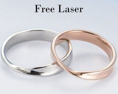 two wedding rings with the text free laser