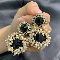 Beautiful black gemstone and pearl jhumka drop earrings . Perfect to wear with traditional wear on weddings or any parties. Lightweight 100% Handmade Closure- pushback Back of the earring is black leather. Each piece is handmade with love.  Free shipping to Canada and USA. It will be shipped via regular non trackable Canada post parcel within 2 days after placing the order. Estimate shipping times for Canada is 4-6 days. USA- 1-2 weeks. Thankyou for checking out my shop! If you have any question Black Jhumka, Indian Wedding Earrings, White Pakistani Suit, Black Kurti, Black Frock, Indo Western Dress, Traditional Earrings, Designer Outfits, Kundan Earrings