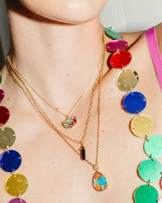 Graphic, arresting, and fun - this Collage Necklace is for the fashionista who wants to make a statement. With a medley of candy-colored gemstones in a playful collage design, it's sure to turn heads. And the versatile length chain means it can be worn with any neckline. So step out of the ordinary and be ready for a rainbow of compliments! Collage Necklace, Colored Gemstones, Collage Design, Be Ready, A Rainbow, Gemstone Colors, Gemstone Pendant, The Ordinary, A R