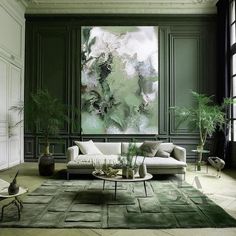 an elegant living room with green walls and rugs, large painting on the wall