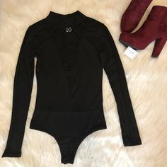 A Fitted Simple Yet Flattering Bodysuit. Style Bodysuit, Tank Top Bodysuit, Fishnet Bodysuit, Black Cage, Free People Bodysuit, Square Neck Bodysuit, Velvet Bodysuit, Striped Bodysuit, Black Fishnets